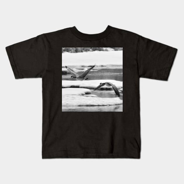 Geese coming in for a landing in black and white Kids T-Shirt by CanadianWild418